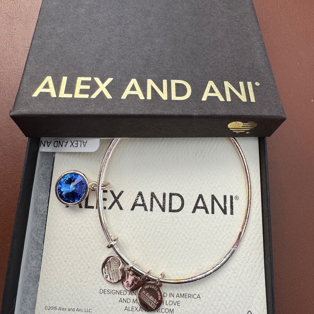 Alex and Ani Silver Bangle with Blue Charm